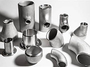 Heat treatment of steel pipe fittings